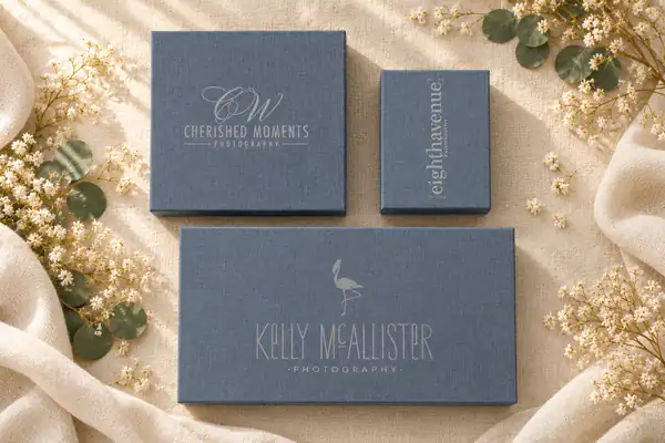 Slate grey elegant USB gift boxes with photographers' logos on ivory linen